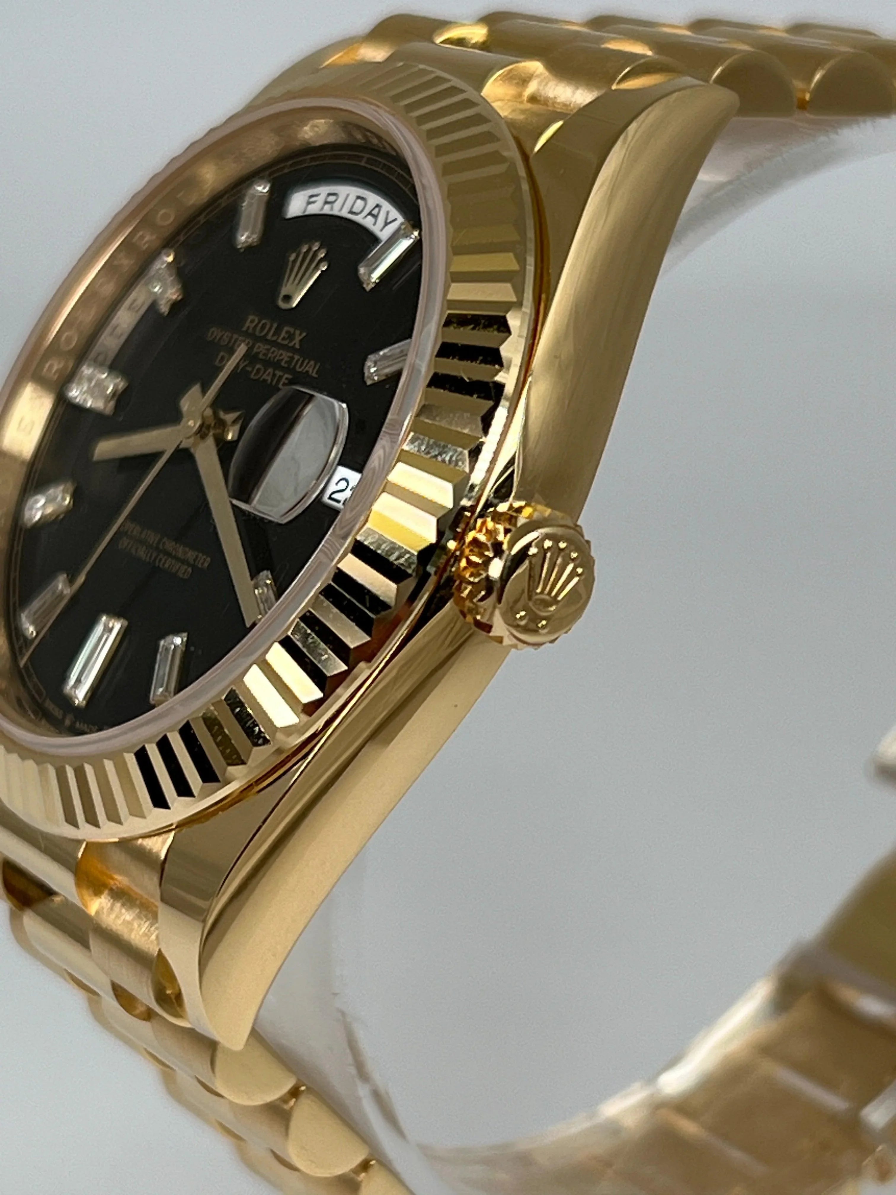 ROLEX DAY-DATE 40 BLACK DIAMOND BAGUETTE DIAL 228238