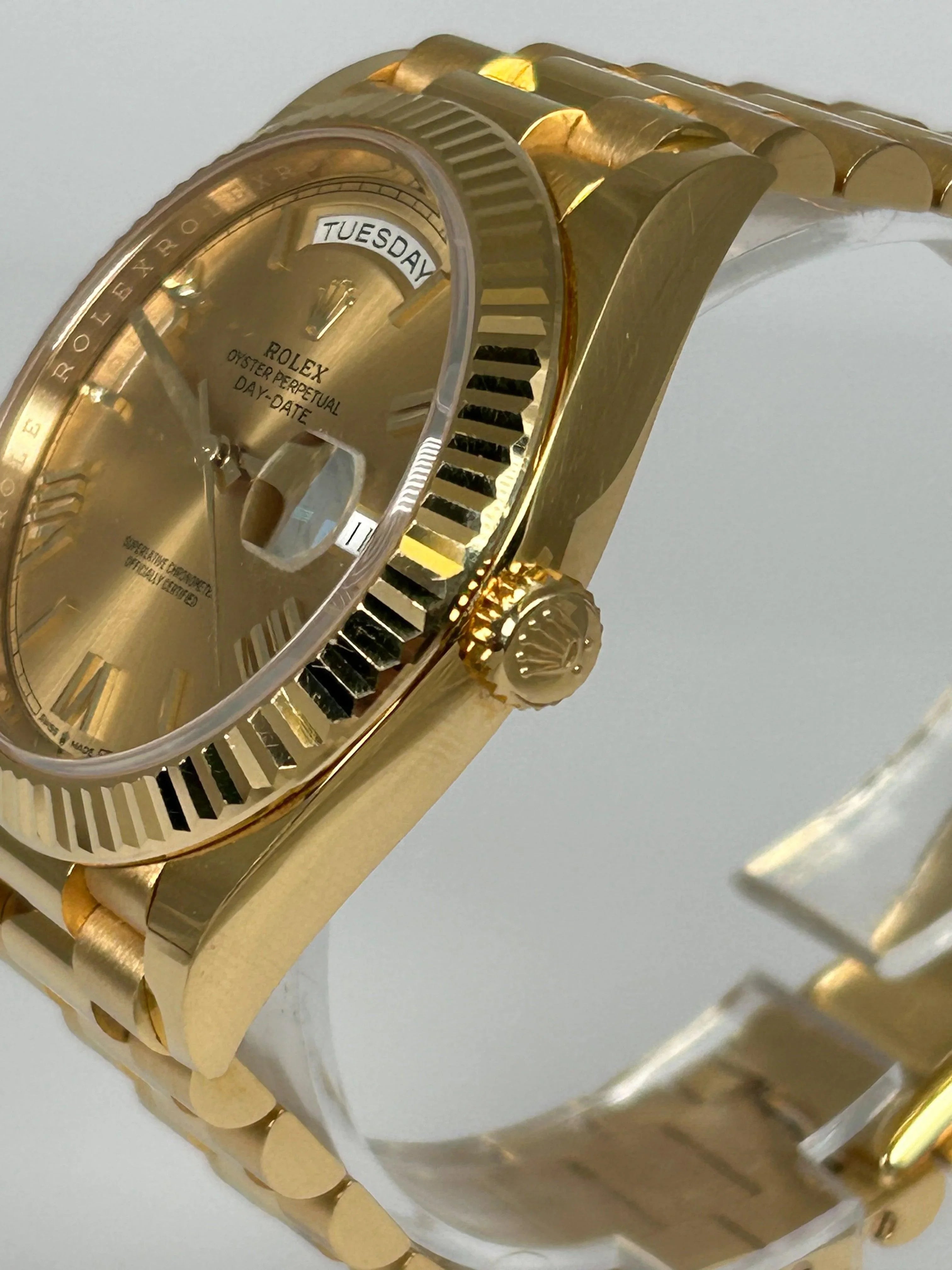 Rolex Day-Date 40 Champagne Roman Yellow Gold 228238