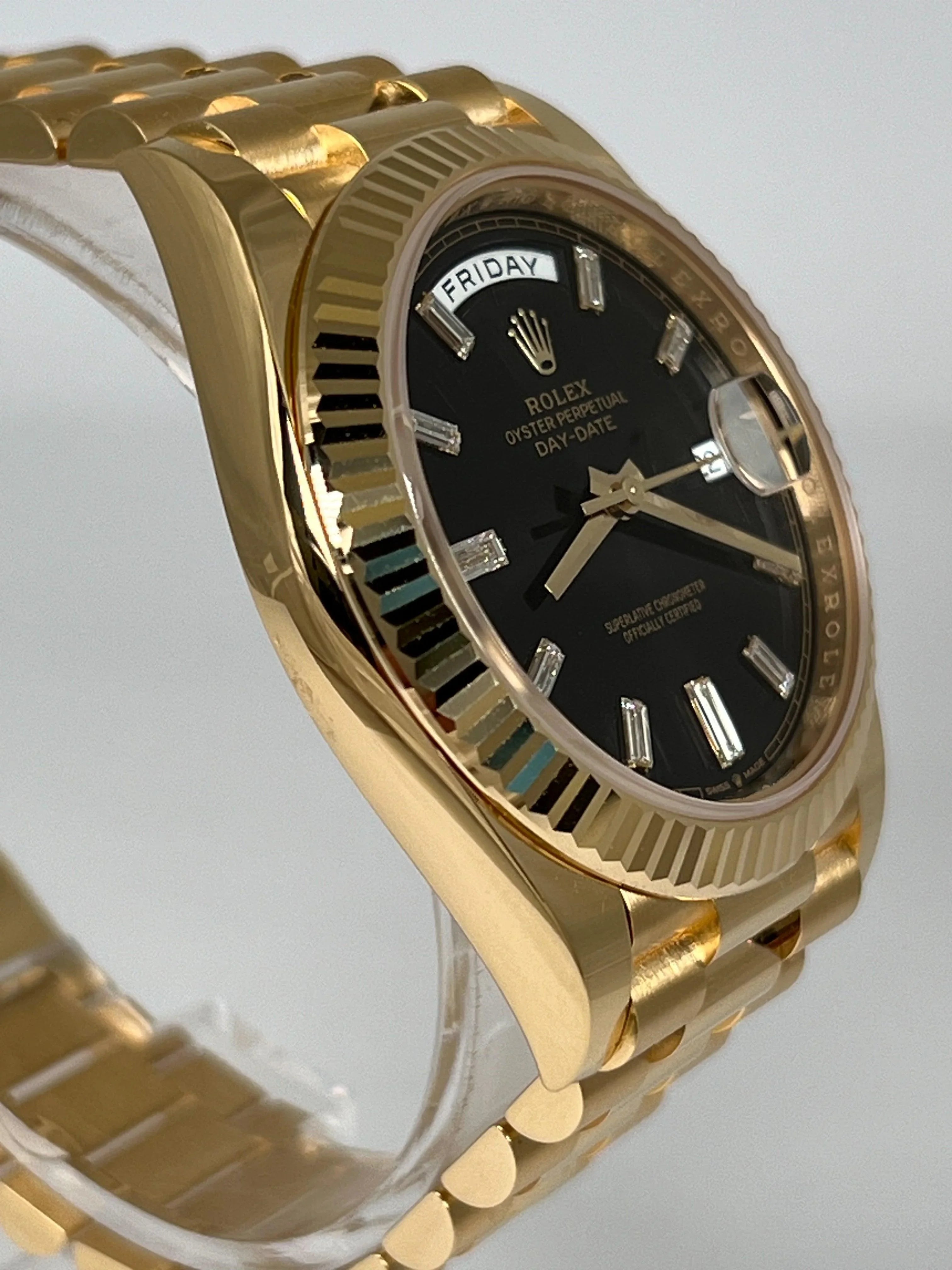 ROLEX DAY-DATE 40 BLACK DIAMOND BAGUETTE DIAL 228238