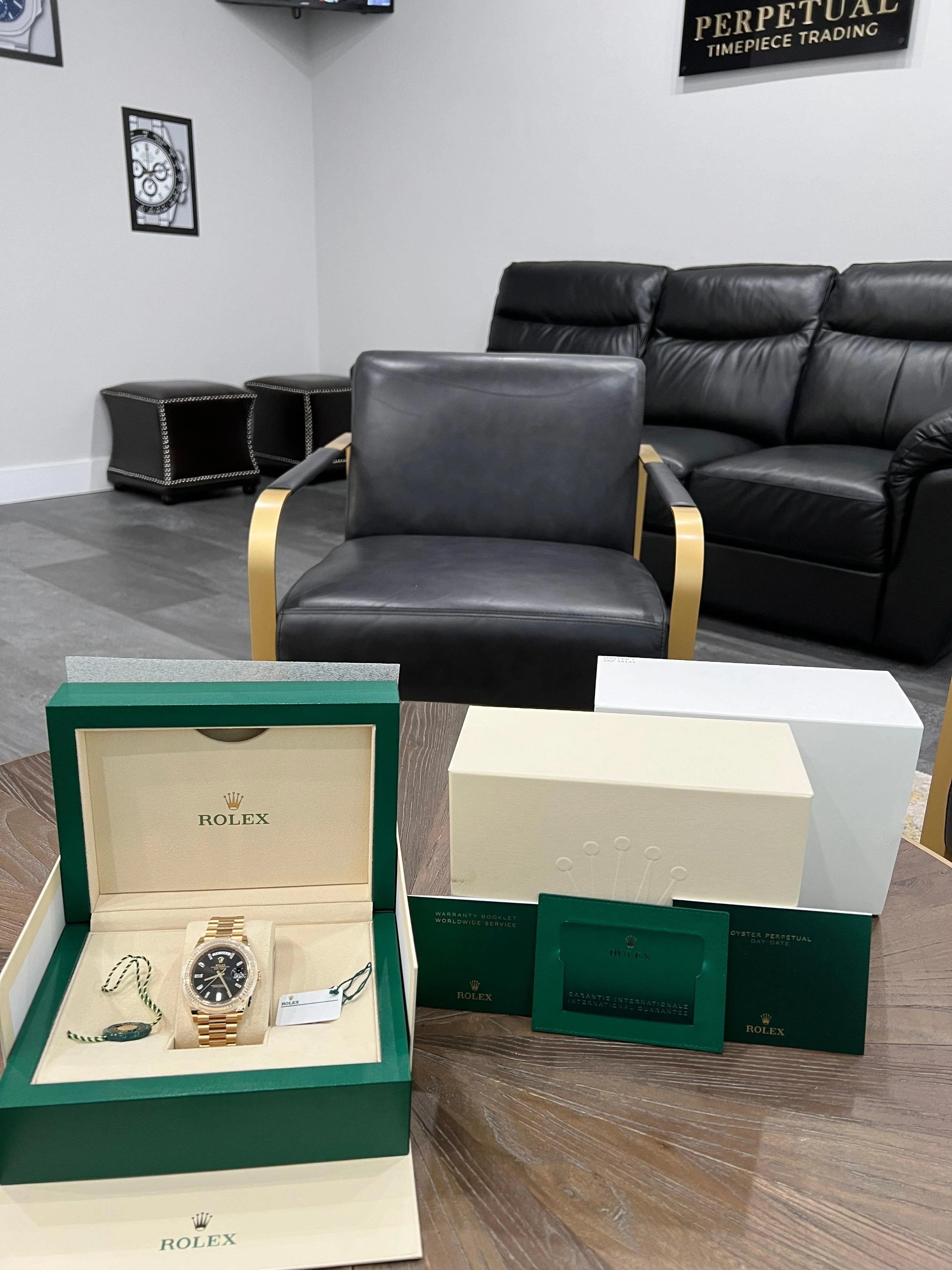 ROLEX DAY-DATE 40 BLACK ONYX BAGUETTE DIAL 228238