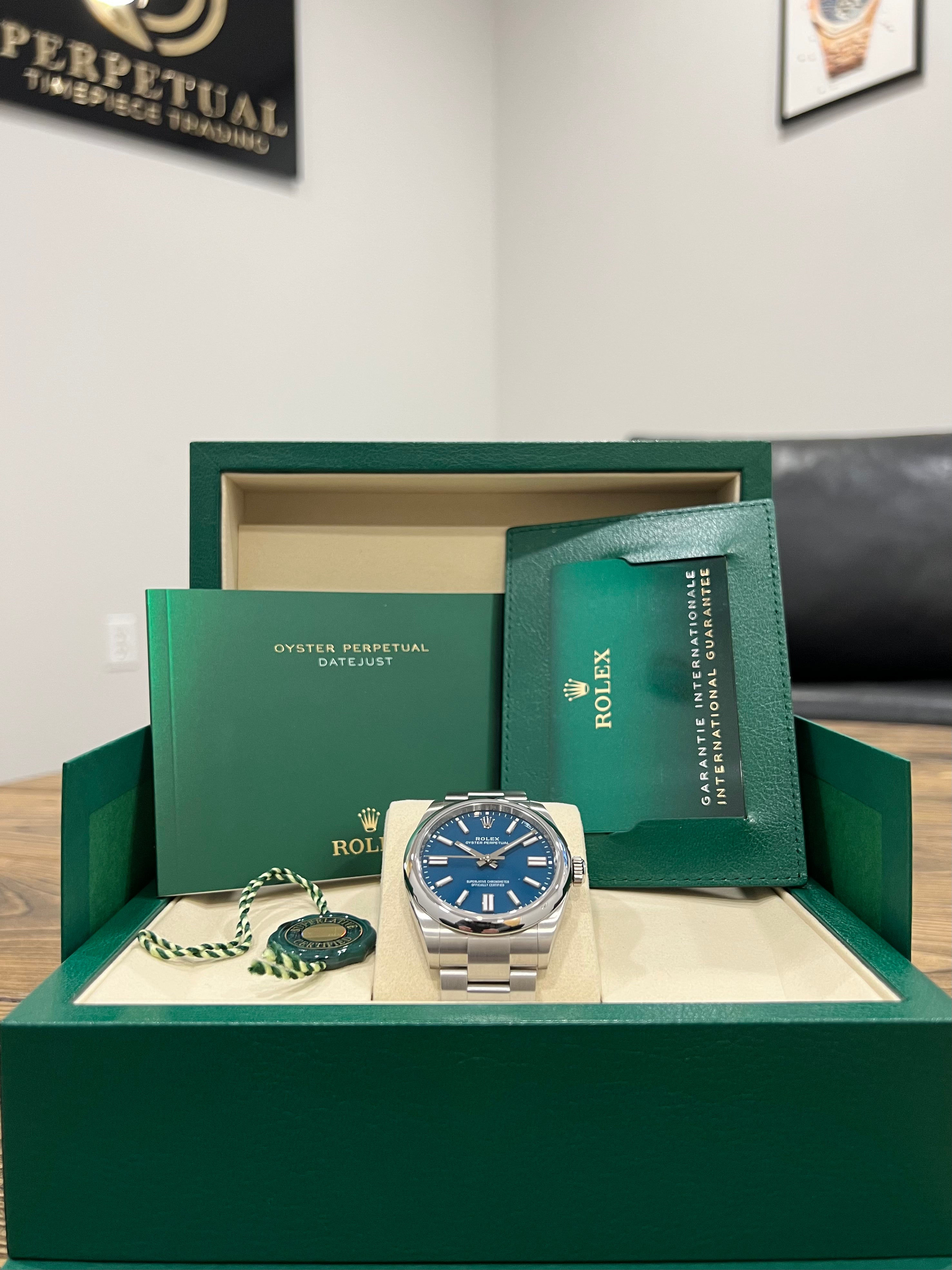 ROLEX OYSTER PERPETUAL 41MM MED BLUE 134300