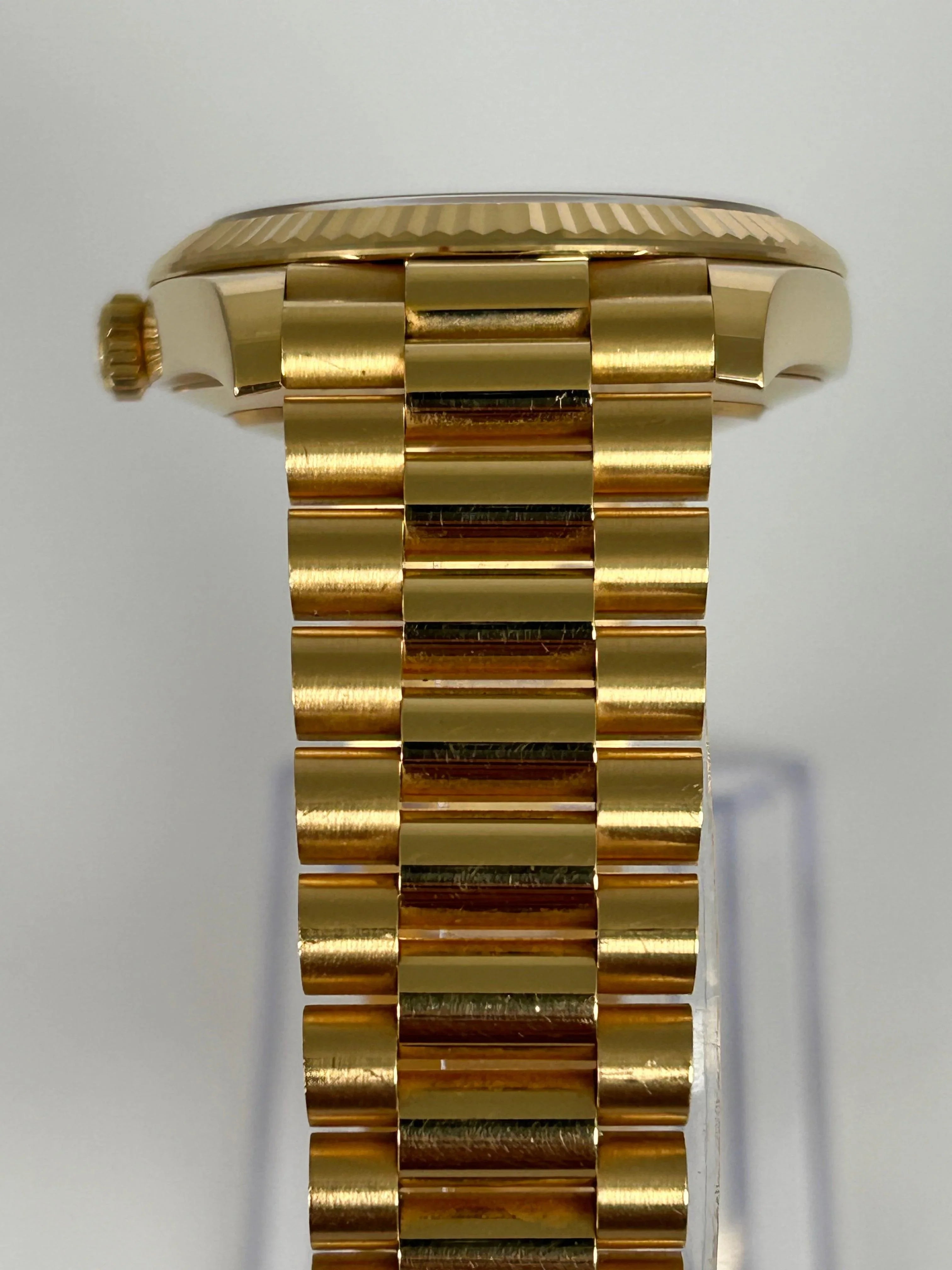 Rolex Day-Date 40 Champagne Roman Yellow Gold 228238