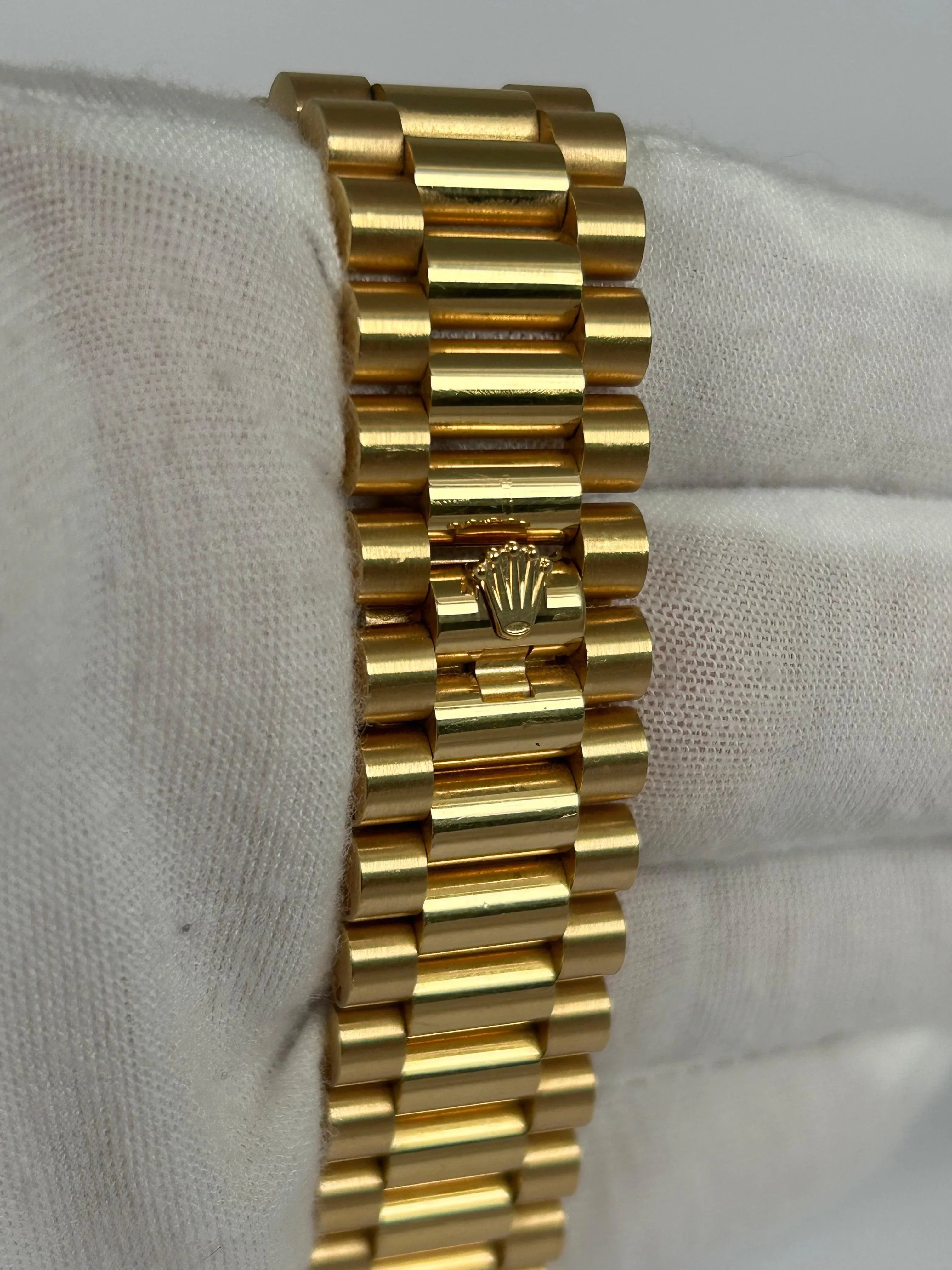 Rolex Day-Date 40 Champagne Roman Yellow Gold 228238