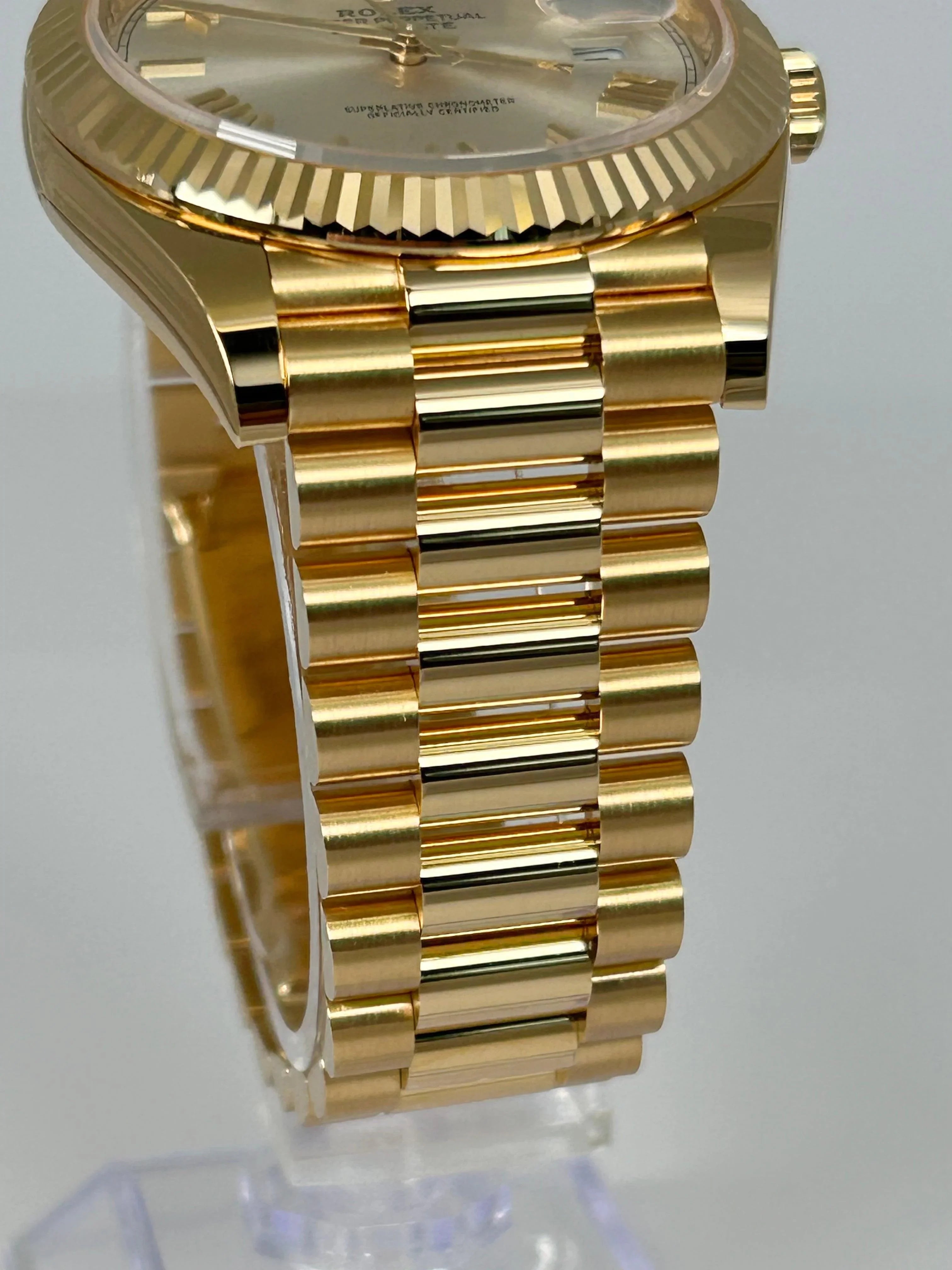 Rolex Day-Date 40 Silver Roman Yellow Gold 228238