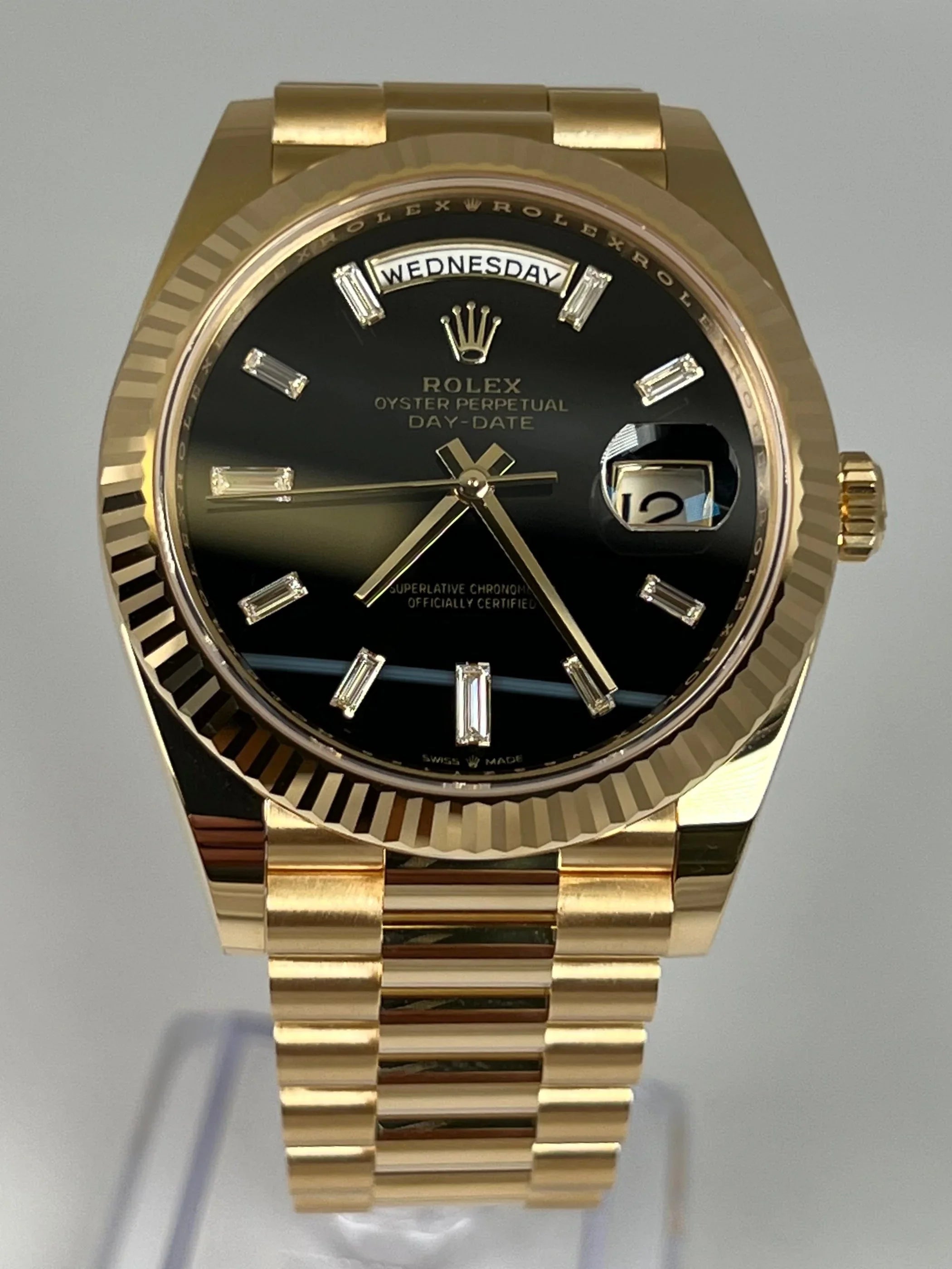 ROLEX DAY-DATE 40 BLACK ONYX BAGUETTE DIAL 228238