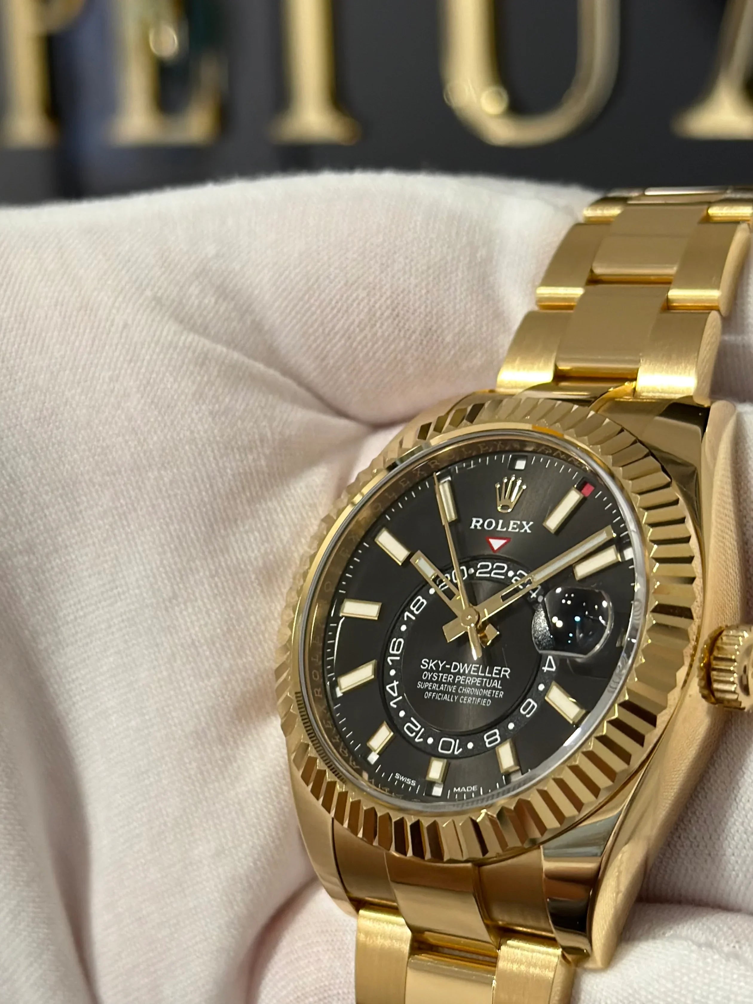 ROLEX SKY DWELLER YELLOW GOLD BLACK DIAL 326938