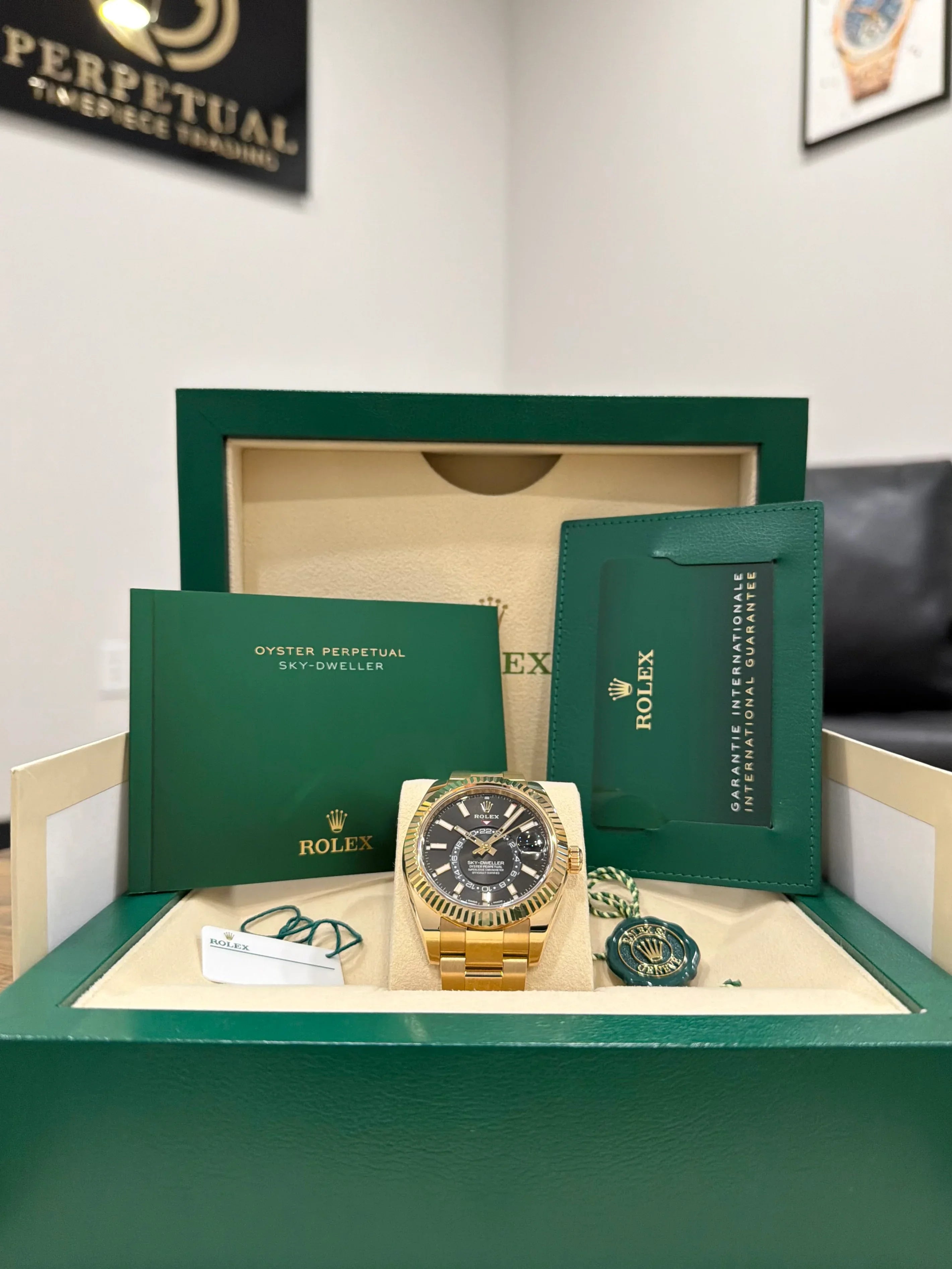 ROLEX SKY DWELLER YELLOW GOLD BLACK DIAL 326938