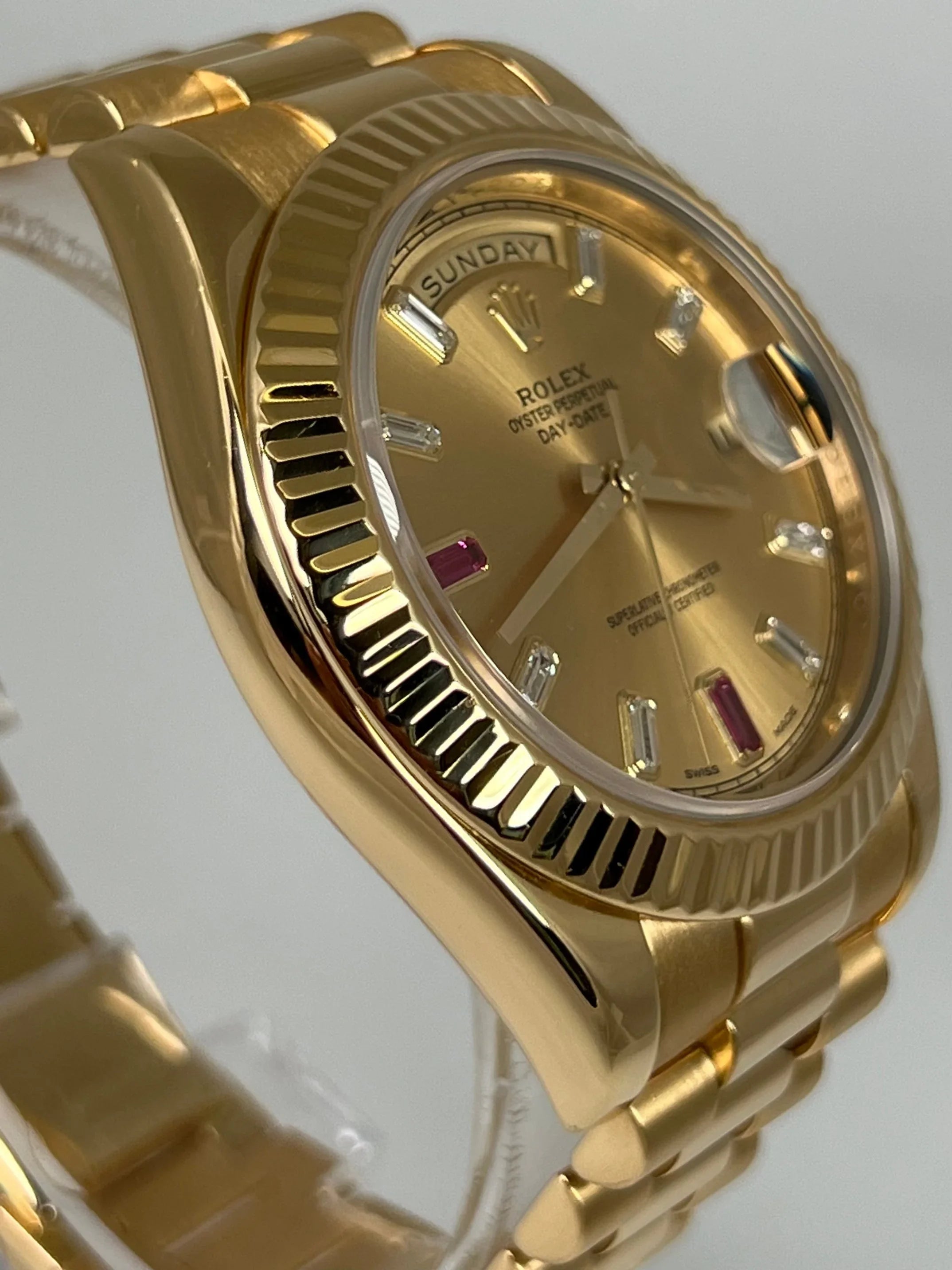 ROLEX DAY-DATE 41MM RED RUBY CHAMPAGNE 218238