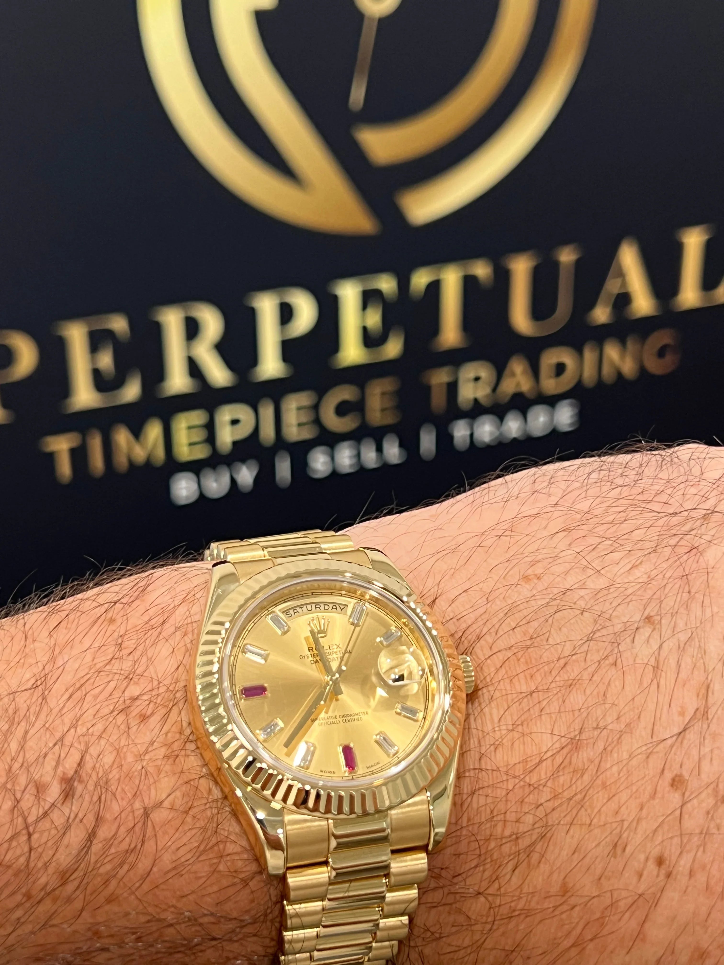 ROLEX DAY-DATE 41MM RED RUBY CHAMPAGNE 218238