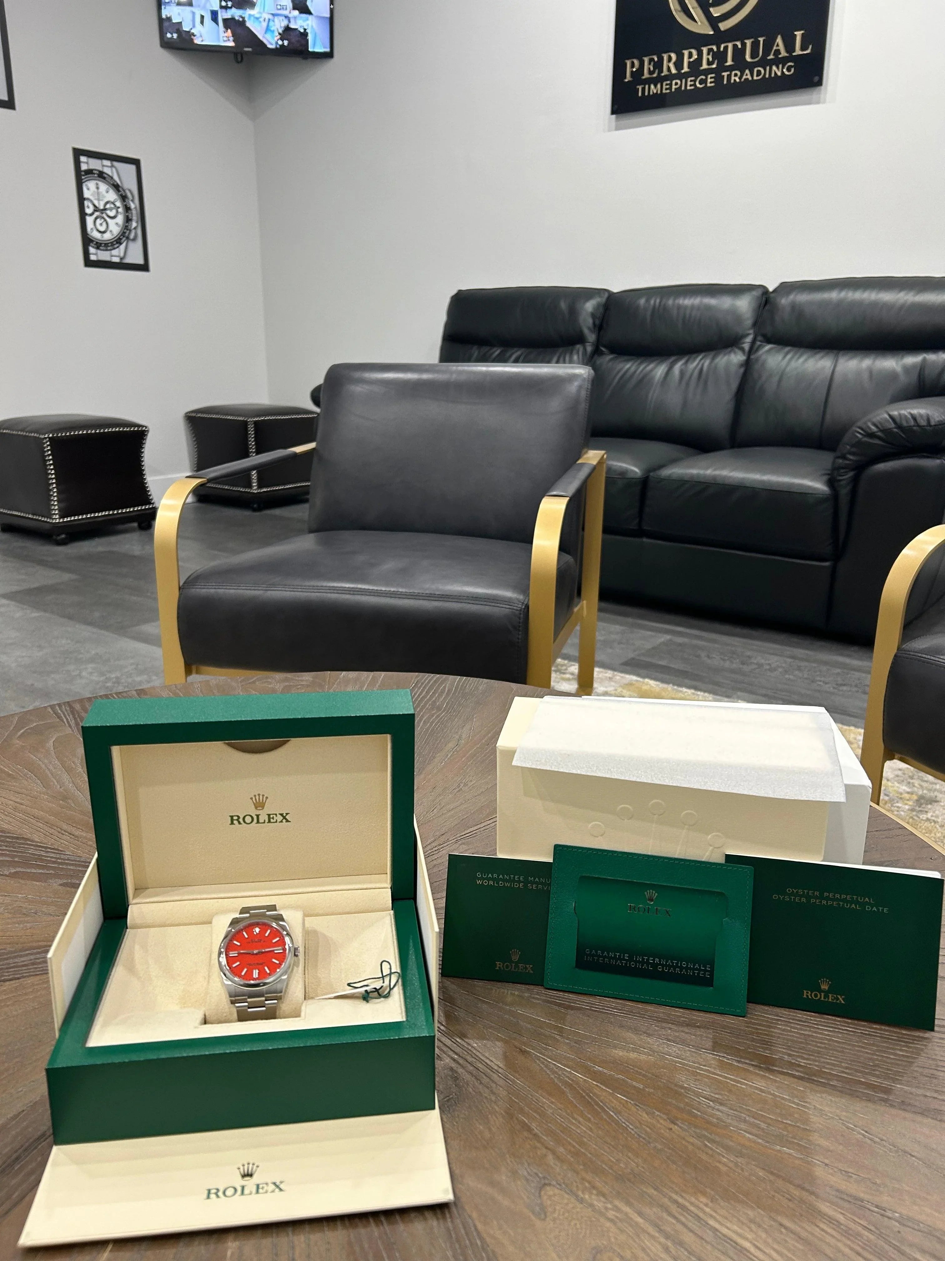 ROLEX OYSTER PERPETUAL 41MM CORAL RED 124300